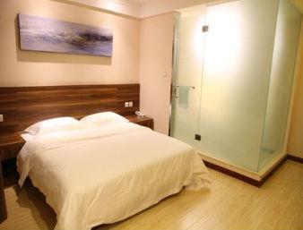 Hotel Super 8 Yantai Train Station Dayue Cheng Habitación foto